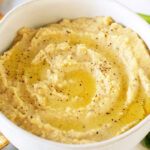 lemon pepper hummus with pretzels, peppers, and crackers