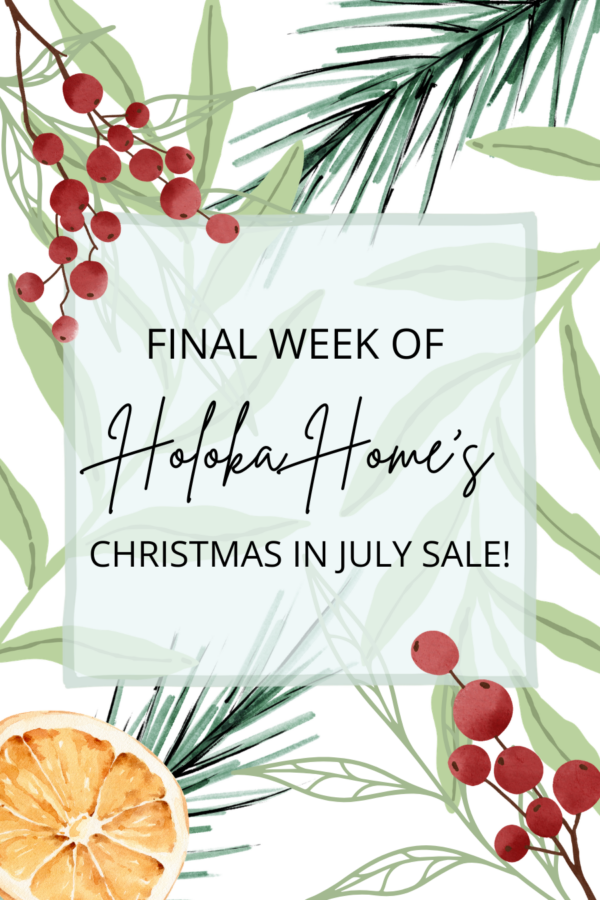 Canva designed graphic about Holoka Home's Christmas in July sale on Etsy. Graphic features a botanical design including pine needles, green foliage, red berry stems, and an orange all in a watercolor style.